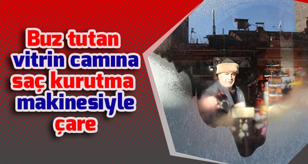 Buz tutan vitrin camına saç kurutma makinesiyle çare