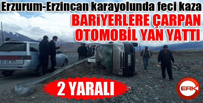 Bariyerlere çarpan otomobil yan yattı: 2 yaralı...