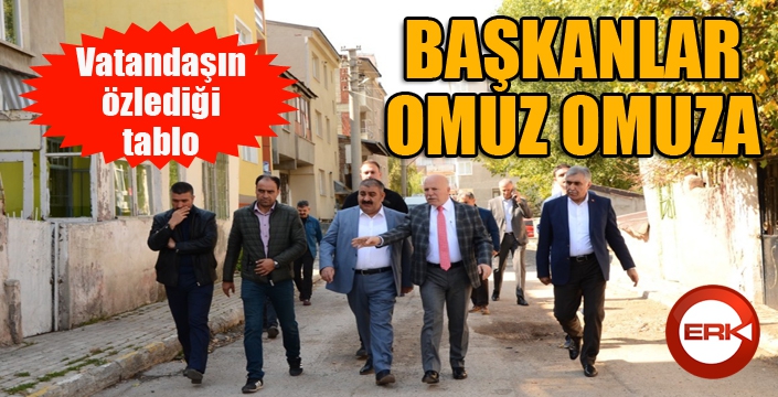 İki başkan omuz omuza