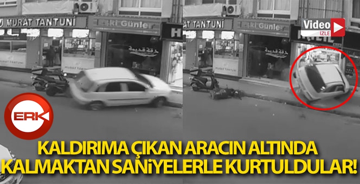 Kaldırıma çıkan aracın altında kalmaktan saniyelerle kurtuldular