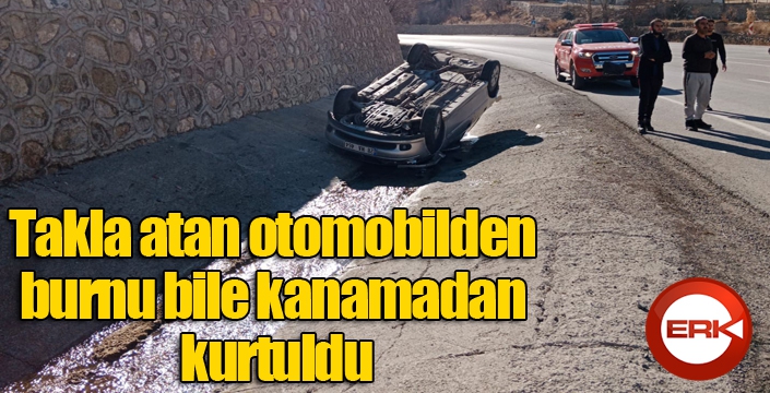 Takla atan otomobilden burnu bile kanamadan kurtuldu