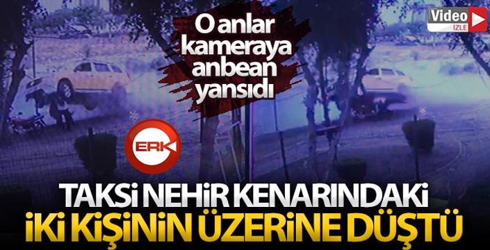 Taksi nehir kenarındaki iki kişinin üzerine böyle düştü