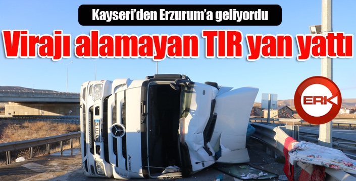 Virajı alamayan TIR yan yattı...